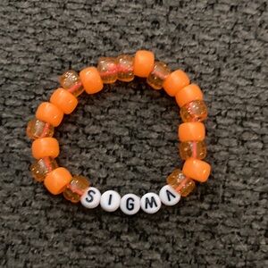 Orange Kandi bracelet, Sigma lettering